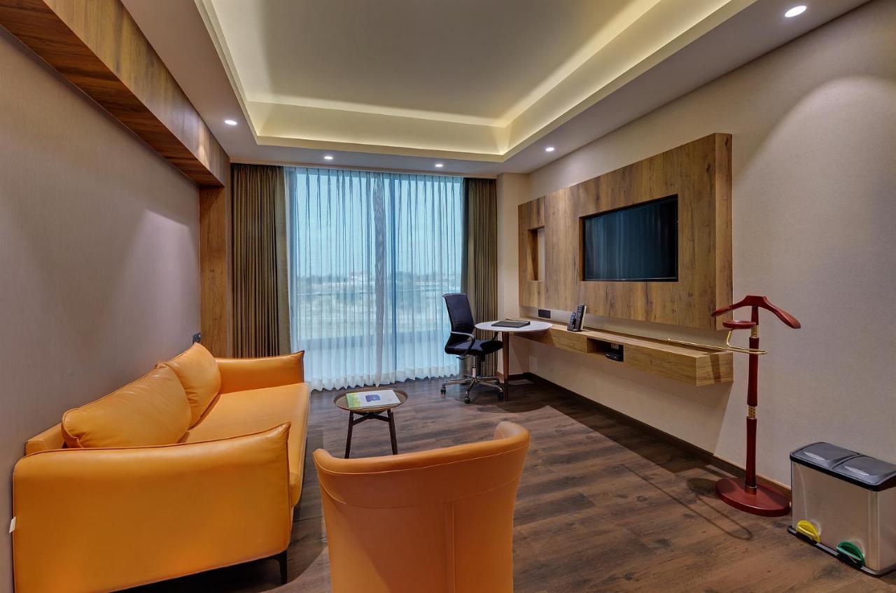 The Fern Royal Farm Resort, Anjar Bagian luar foto